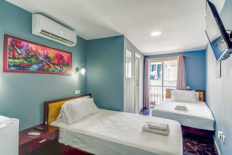 Standard Twin Room, 2 Twin Beds, Balcony, City View | Free WiFi, bed sheets