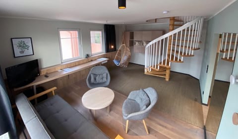 Junior Penthouse, Multiple Beds | Living area | TV