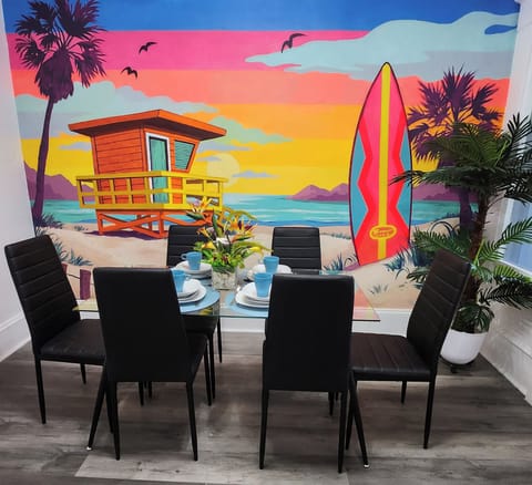 A Tropical beach mural painted by local artist. A special Instagram moment.