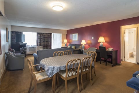 Superior Suite, 2 Bedrooms, Balcony | Living area | TV