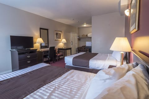 Executive Room, 2 Queen Beds | Desk, laptop workspace, iron/ironing board, free WiFi