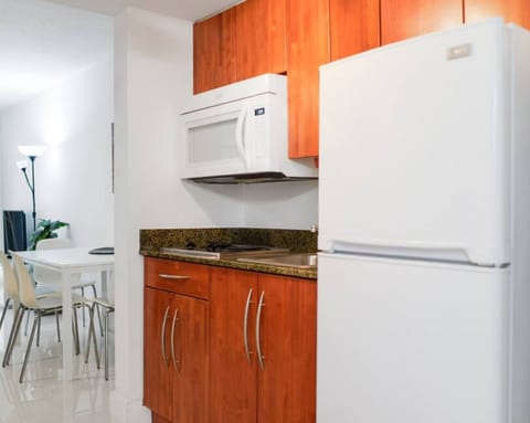 Business Condo | Private kitchenette | Full-size fridge, microwave, stovetop, toaster