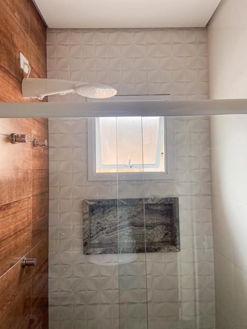 Shower, towels, soap, toilet paper