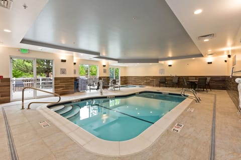 Indoor pool, open 8:00 AM to 10:00 PM, pool umbrellas, sun loungers