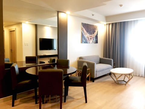 Deluxe Double Room | Living area | Smart TV