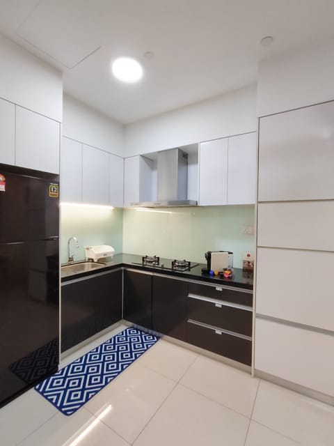 Apartment | Private kitchen | Full-size fridge, microwave, cookware/dishes/utensils, dining tables