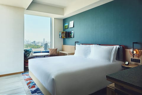 Premium Room, 1 King Bed, Corner (High Floor) | Minibar, in-room safe, blackout drapes, free WiFi