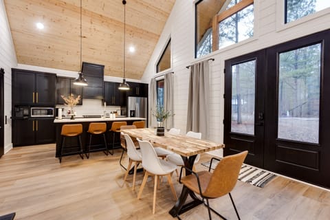 Wide open doors welcoming inside a modern kitchen