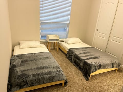 Bedroom #3 with 2 twin beds.  (Daybed unstacked)