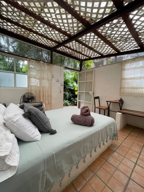 Economy Bungalow, 1 Bedroom, Garden View | Desk, blackout drapes, iron/ironing board, free WiFi