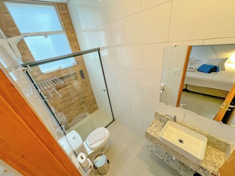 Suite | Bathroom | Shower, hair dryer, towels, soap