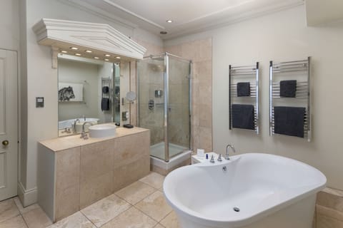 Deluxe Room | Bathroom | Shower, designer toiletries, hair dryer, bathrobes