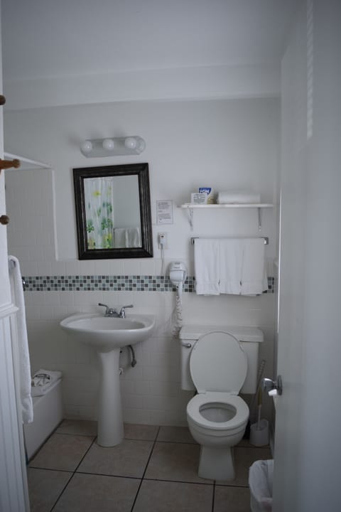 Standard Room, 2 Double Beds, Beachfront | Bathroom | Combined shower/tub, free toiletries, hair dryer, towels