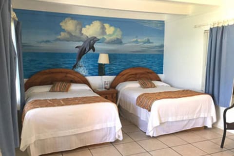 Standard Room, 2 Double Beds, Beachfront | Iron/ironing board, free WiFi, bed sheets