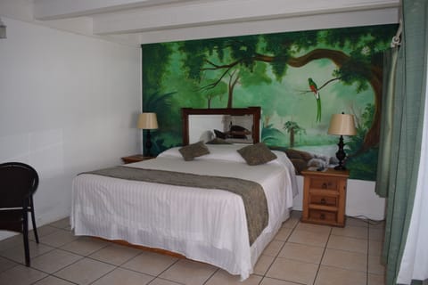 Standard Room, 1 King Bed, Beachfront | Iron/ironing board, free WiFi, bed sheets