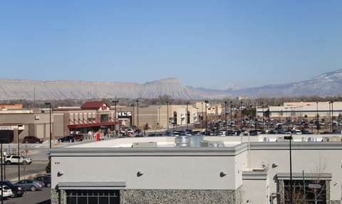 Hypo-allergenic bedding, desk, blackout drapes, iron/ironing board