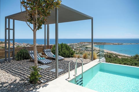 2 sunbeds available under a shaded pergola