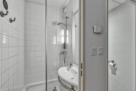 Shower, towels, soap, shampoo