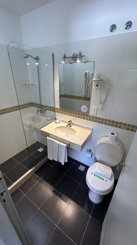 Standard Triple Room | Bathroom | Rainfall showerhead, hair dryer, bidet, towels