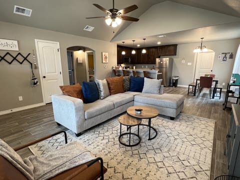 Relax and enjoy coffee, games, or watch TV & movies on our 60 inch Roku TV