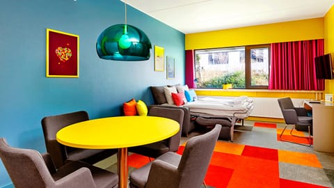 Junior Suite | Living area | Smart TV, foosball