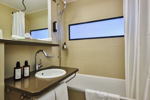 Designer toiletries, hair dryer, bathrobes, slippers