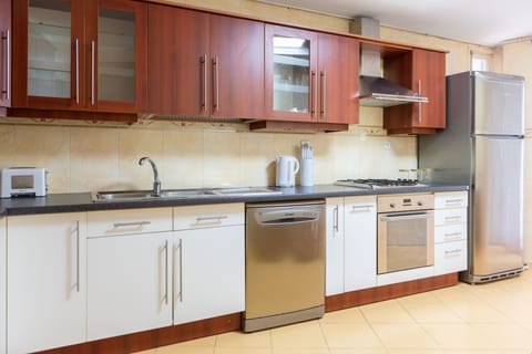 Apartment | Private kitchen | Fridge, microwave, oven, stovetop