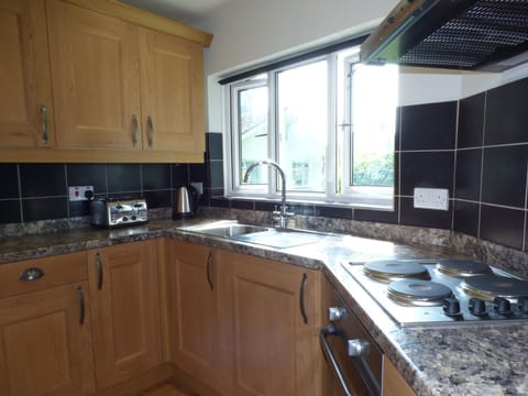 Fridge, electric kettle, toaster, cookware/dishes/utensils