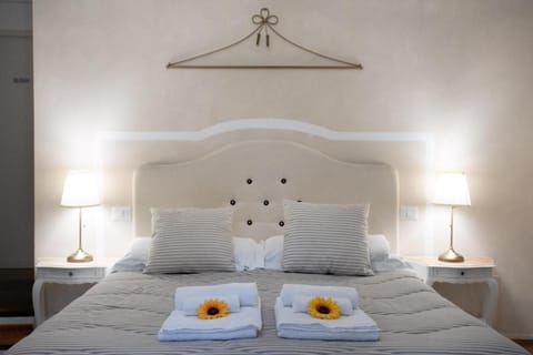 Standard Triple Room | Down comforters, in-room safe, desk, blackout drapes