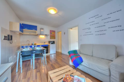 Family Apartment, 1 Bedroom, Mountainside (Casa Umberto) | Living area | 21-inch flat-screen TV with cable channels, TV