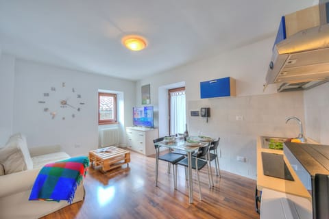 Family Apartment, 1 Bedroom, Mountainside (Casa Umberto) | Living area | 21-inch flat-screen TV with cable channels, TV