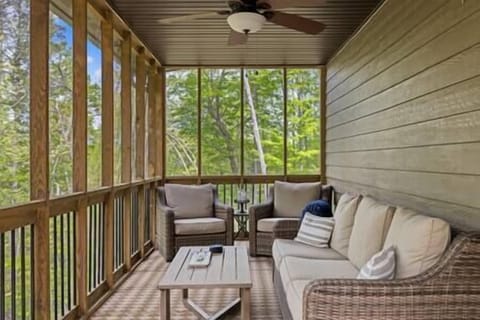 The beautiful screened-in porch! Perfect for your morning mug of coffee or evening drink!