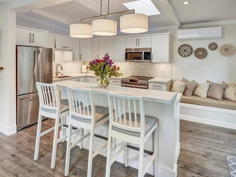 Kitchen with island and bench seat