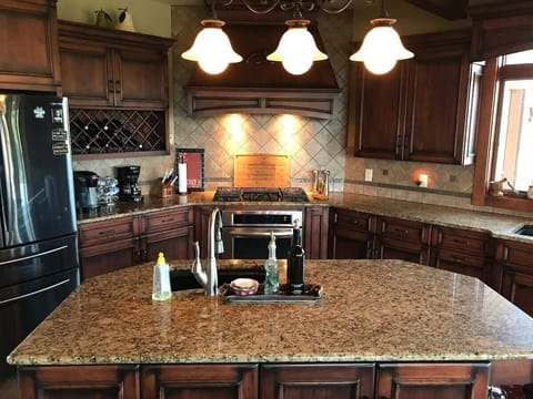 Kitchen has regular oven w gas cook top and 2nd double oven