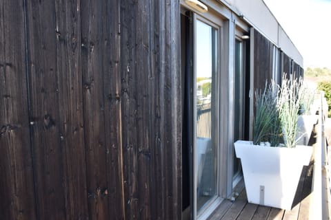 The room features a small balcony.