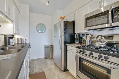 Stylish design and top-notch appliances define this stunning kitchen.