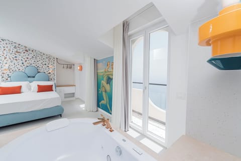 Junior Suite, Balcony, Sea View | Hypo-allergenic bedding, in-room safe, soundproofing, free WiFi