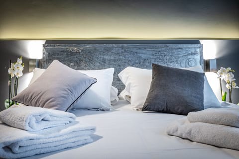 Superior Double Room, River View | Minibar, in-room safe, individually furnished, iron/ironing board