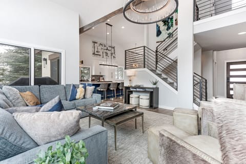 Living Room with Stairs to 2nd Floor