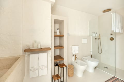 Triple Room | Bathroom | Rainfall showerhead, designer toiletries, hair dryer, bathrobes