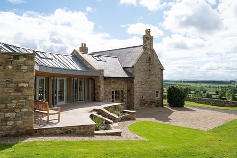 Shepherd's House - the unique curved extension to the front of the property offering stunning elevated views