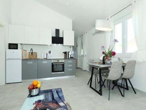 Apartment (One Bedroom Apartment with Balcony) | Private kitchen | Fridge