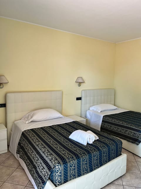 Basic Quadruple Room, 2 Double Beds, Ground Floor | In-room safe, soundproofing, free WiFi, bed sheets