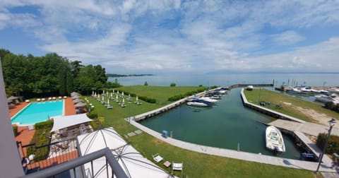 Seasonal outdoor pool, open 8 AM to 8:00 PM, pool umbrellas