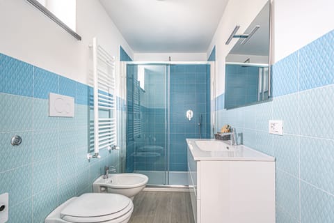 Triple Room | Bathroom | Shower, rainfall showerhead, hair dryer, bathrobes