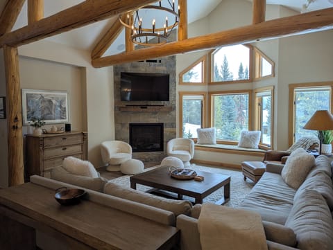 Updated great room with gas fireplace, 65" TV, sound bar, sonos and sectional