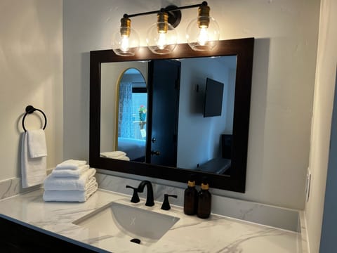 Standard Room, 2 Queen Beds | Bathroom | Combined shower/tub, free toiletries, hair dryer, towels