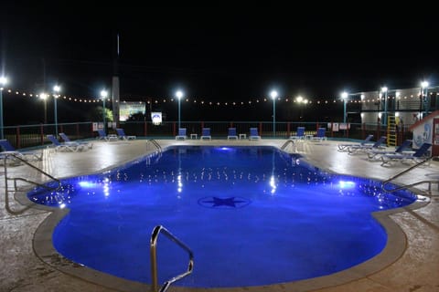 Seasonal outdoor pool, open 7:00 AM to 10:00 PM, free cabanas