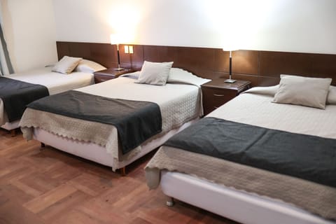 Standard Triple Room | Memory foam beds, minibar, in-room safe, desk