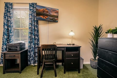 Stay connected and productive during your stay at our convenient office desk - the perfect feature for anyone looking to balance work and play during their travels.